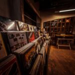 a room with shelves and posters